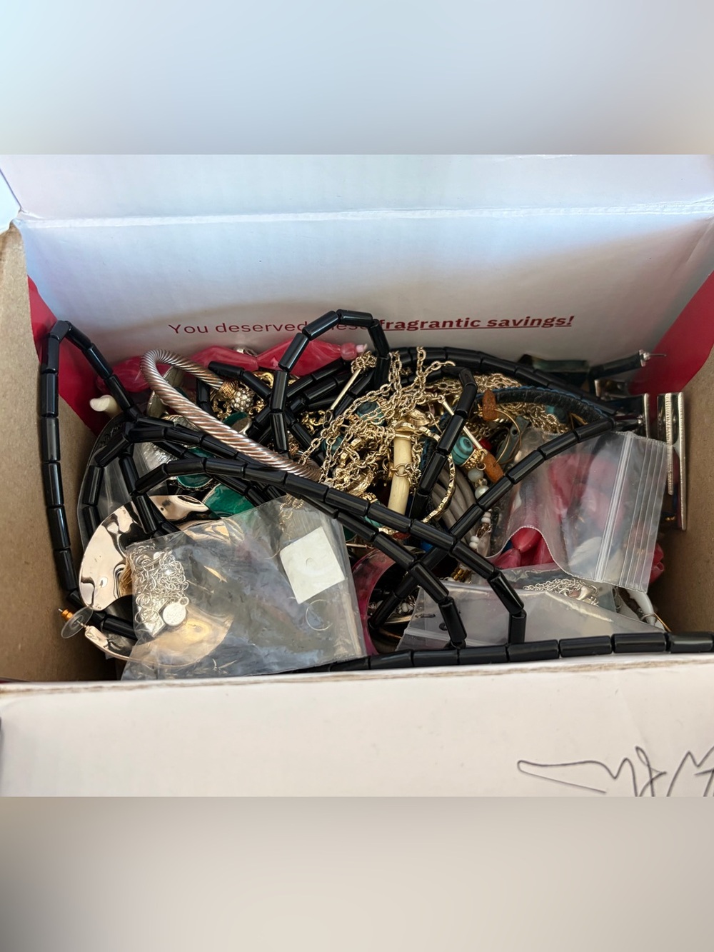 Box of costume jewelry